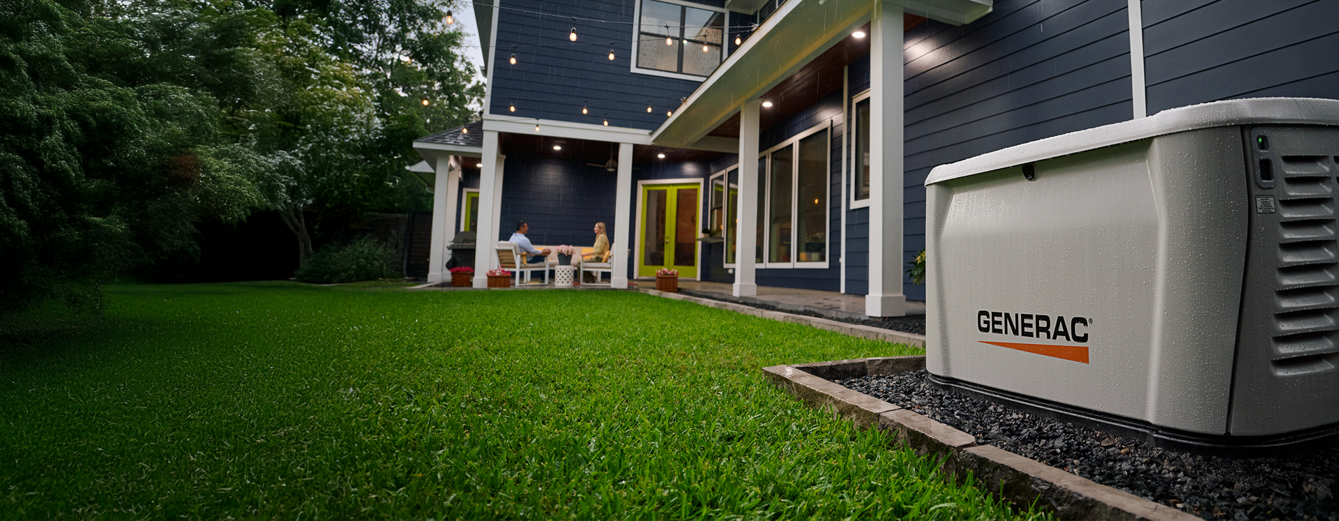 Generac home standby generator powering a home in the rain