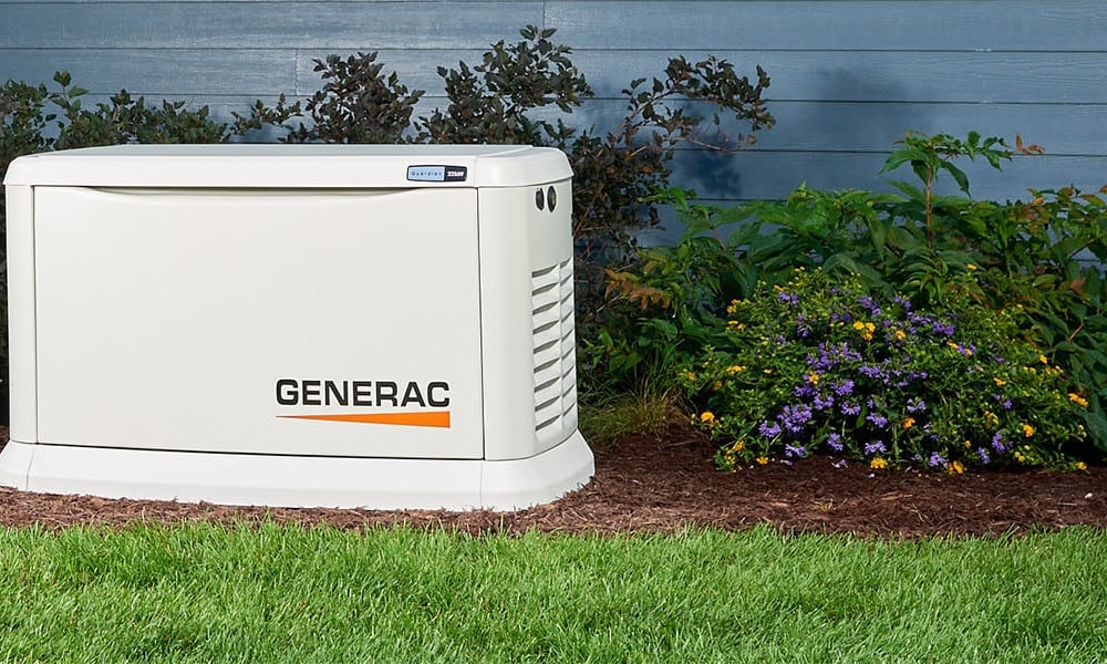 Generac Home Standby Generator in a garden outside a home.