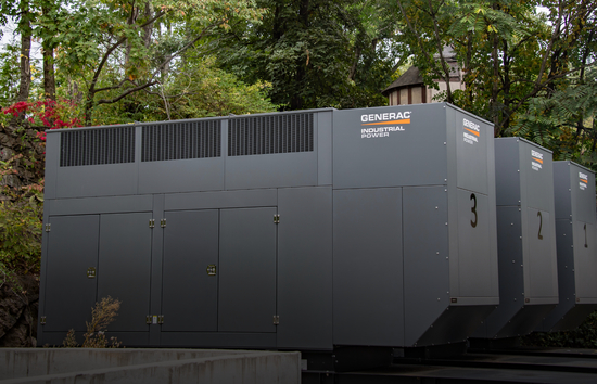 Outdoor installation of three Generac Industrial Energy modular generators, illustrating a real-world backup power solution For Sunshine Hospital in New York featured in Generac's library of case studies.