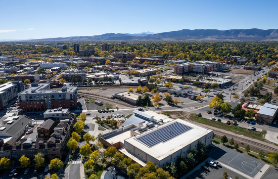 Ariel view of the Northside Aztlan Community Center with solar PV panels on the roof in Fort Collins, Colorado