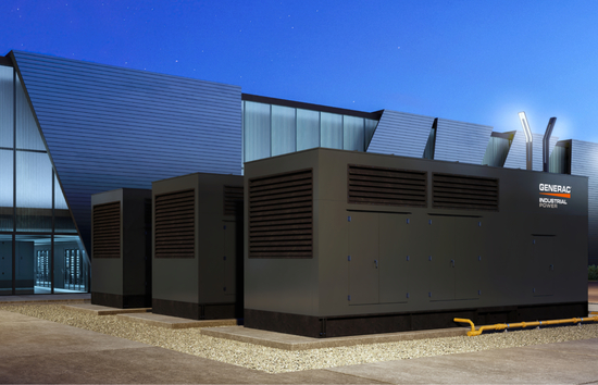 Generac Industrial Energy generator installed outside a data center at dusk