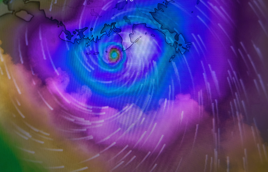 Radar-style weather visualization showing a hurricane approaching the Gulf Coast