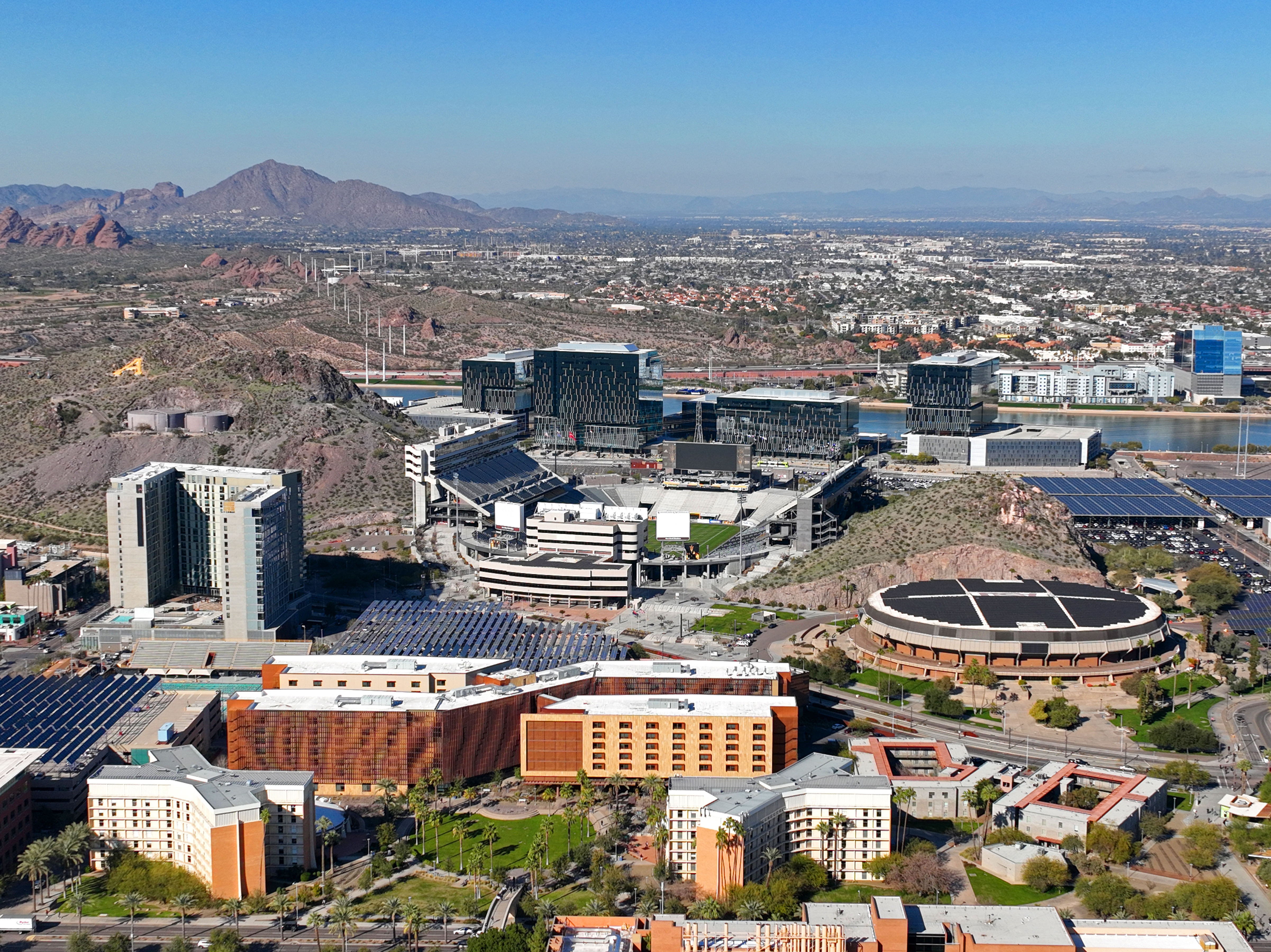 Skyilne image of Tempe, Arizona, home of Arizona State University. Image shows the ASU campus and sports complex