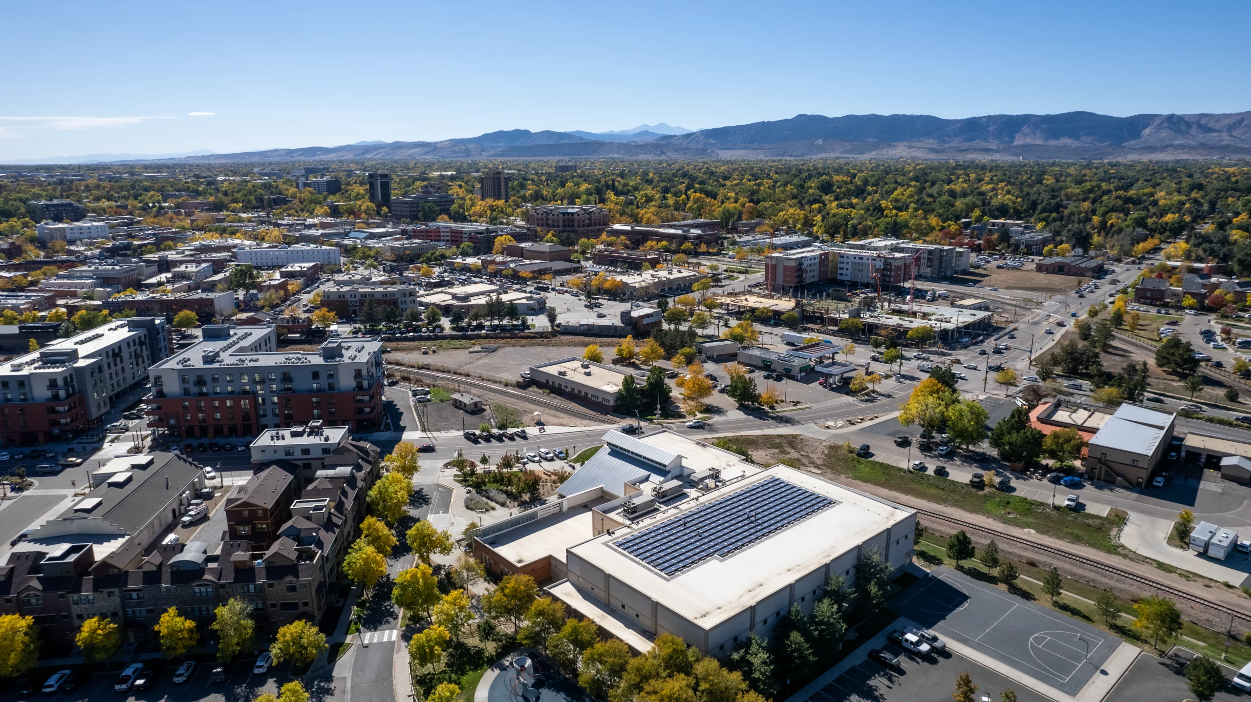 Ariel view of the Northside Aztlan Community Center with solar PV panels on the roof in Fort Collins, Colorado