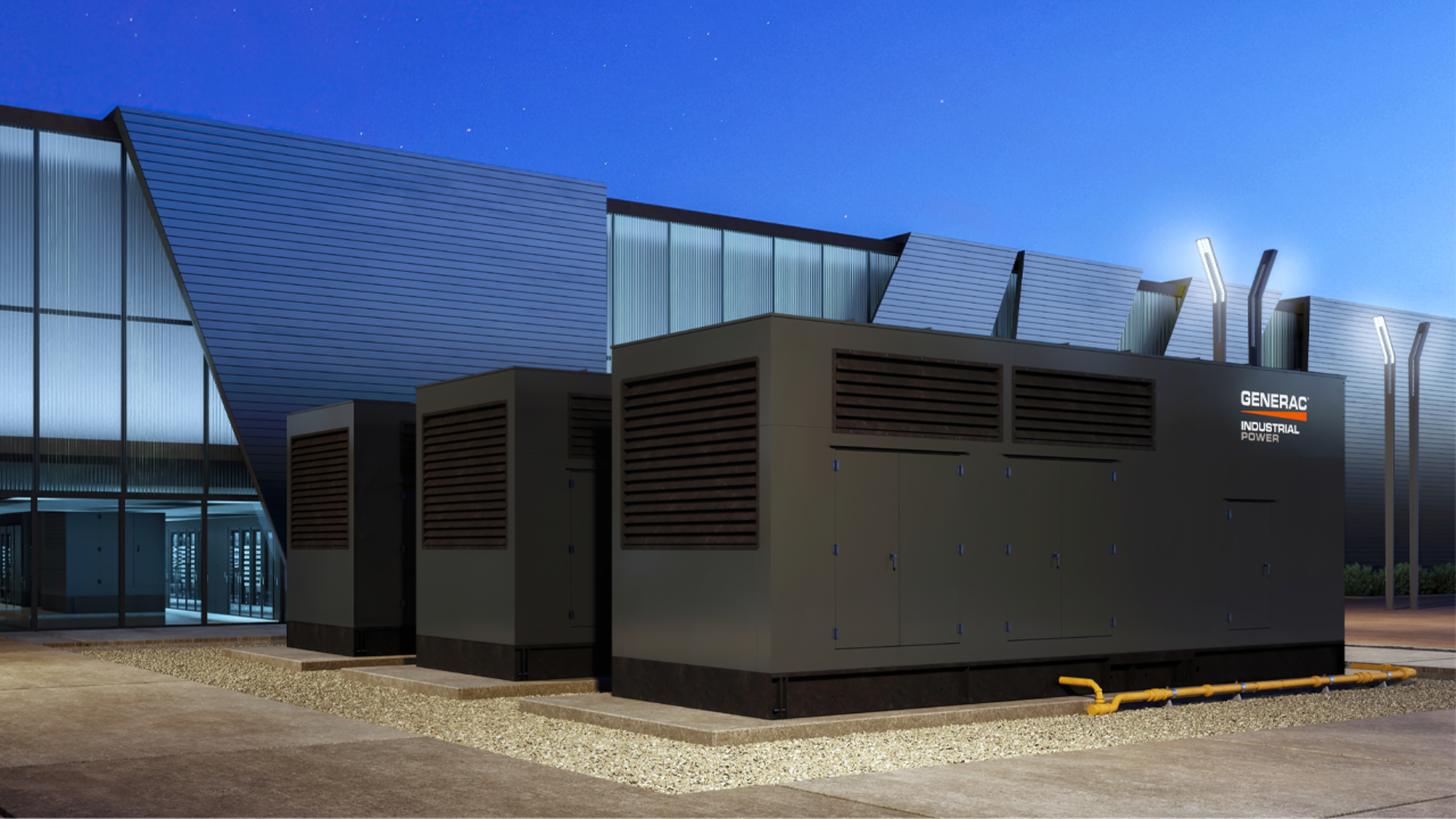 Generac Industrial Energy generator installed outside a data center at dusk