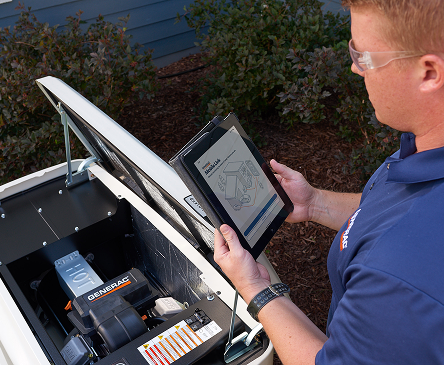 A generac home standby generator getting serviced with the mobile link app