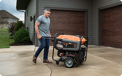 Portable generator being moved outdoors