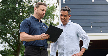 Generac installer showing a customer information on a tablet