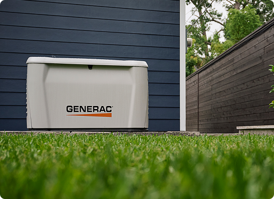 Generac home generator installed outside of home
